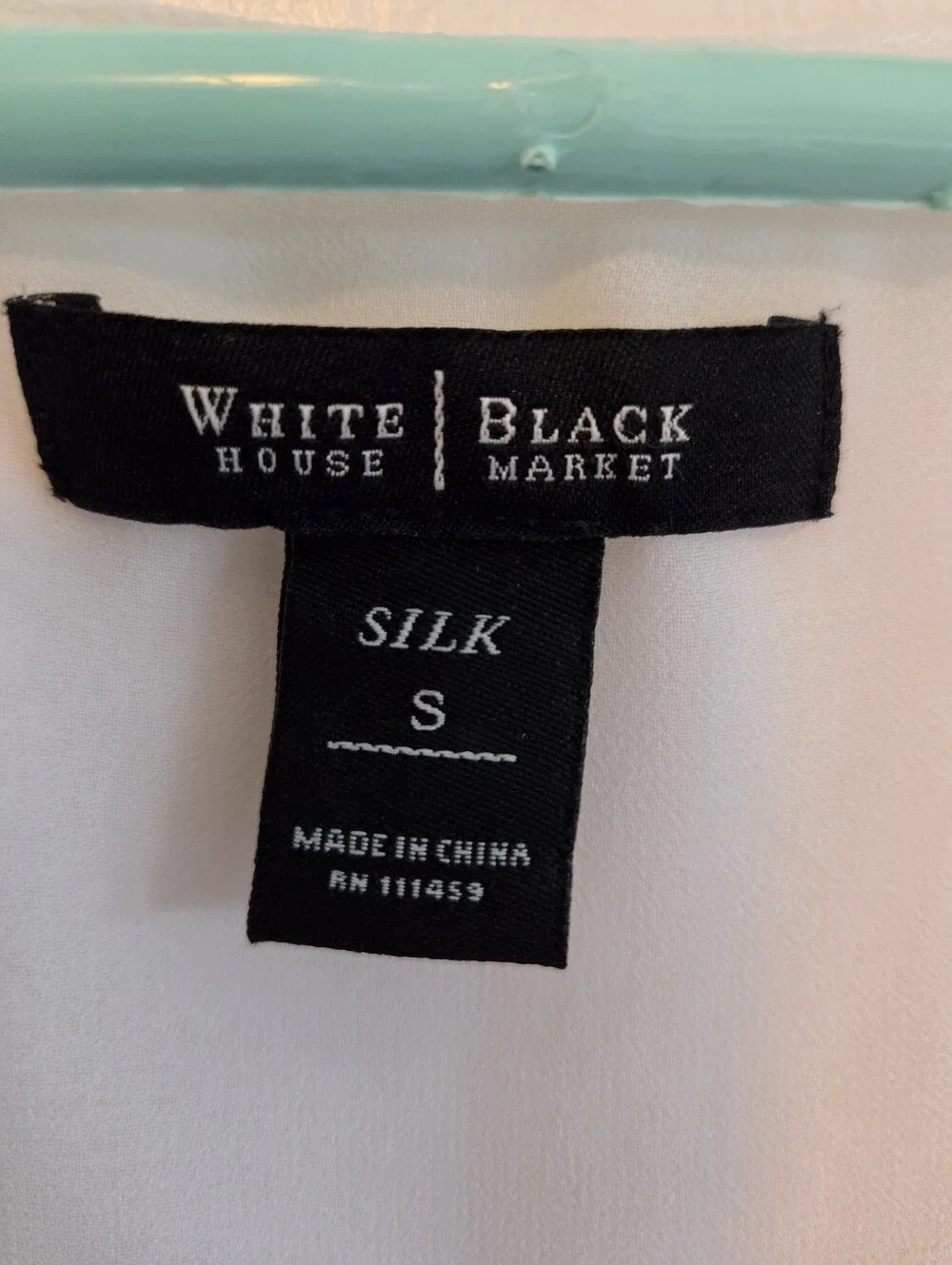 White House Black Market Cream Ruffle V-Neck Sleeveless Top